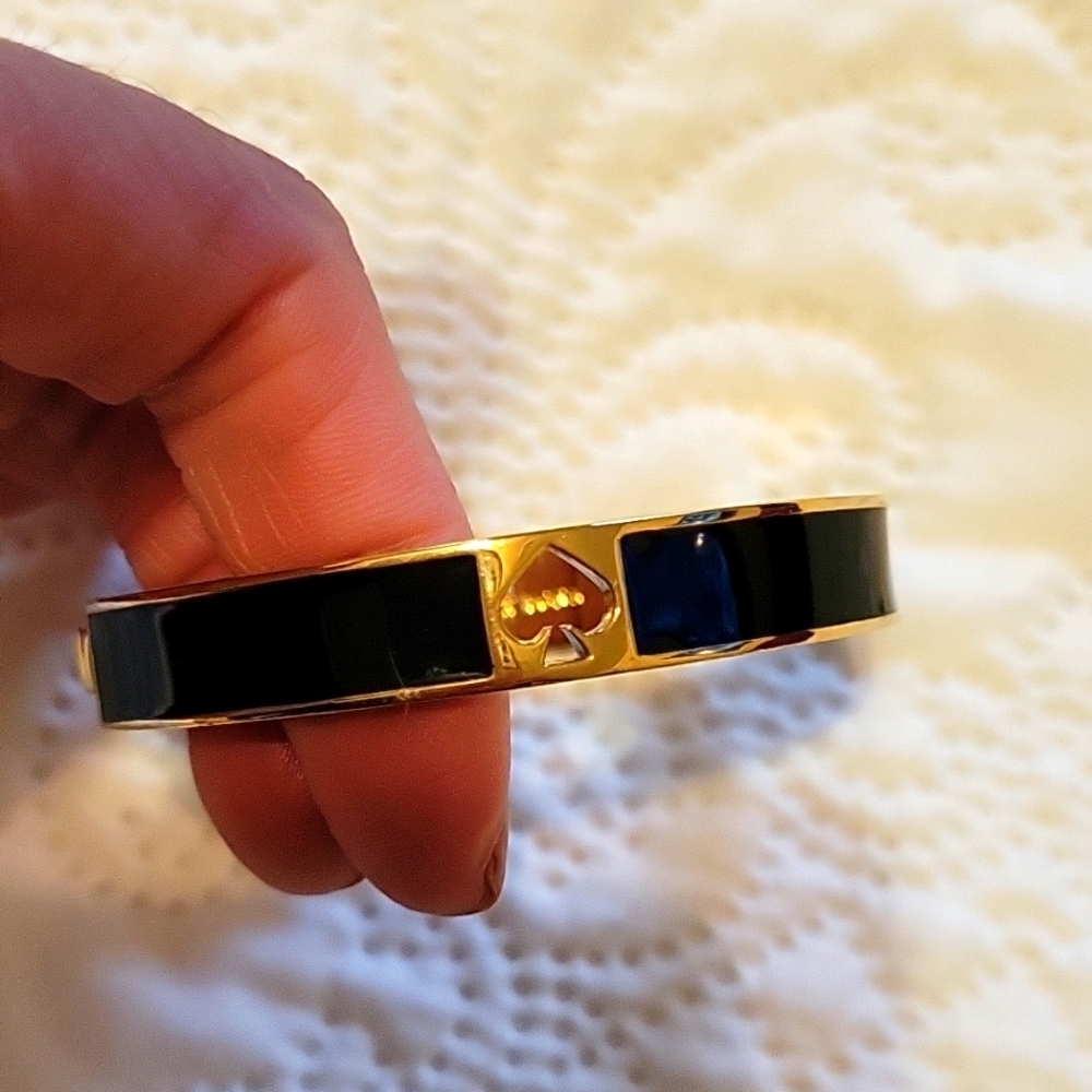 Kate Spade Black and Gold Bangle Hole Punch Spade EUCā